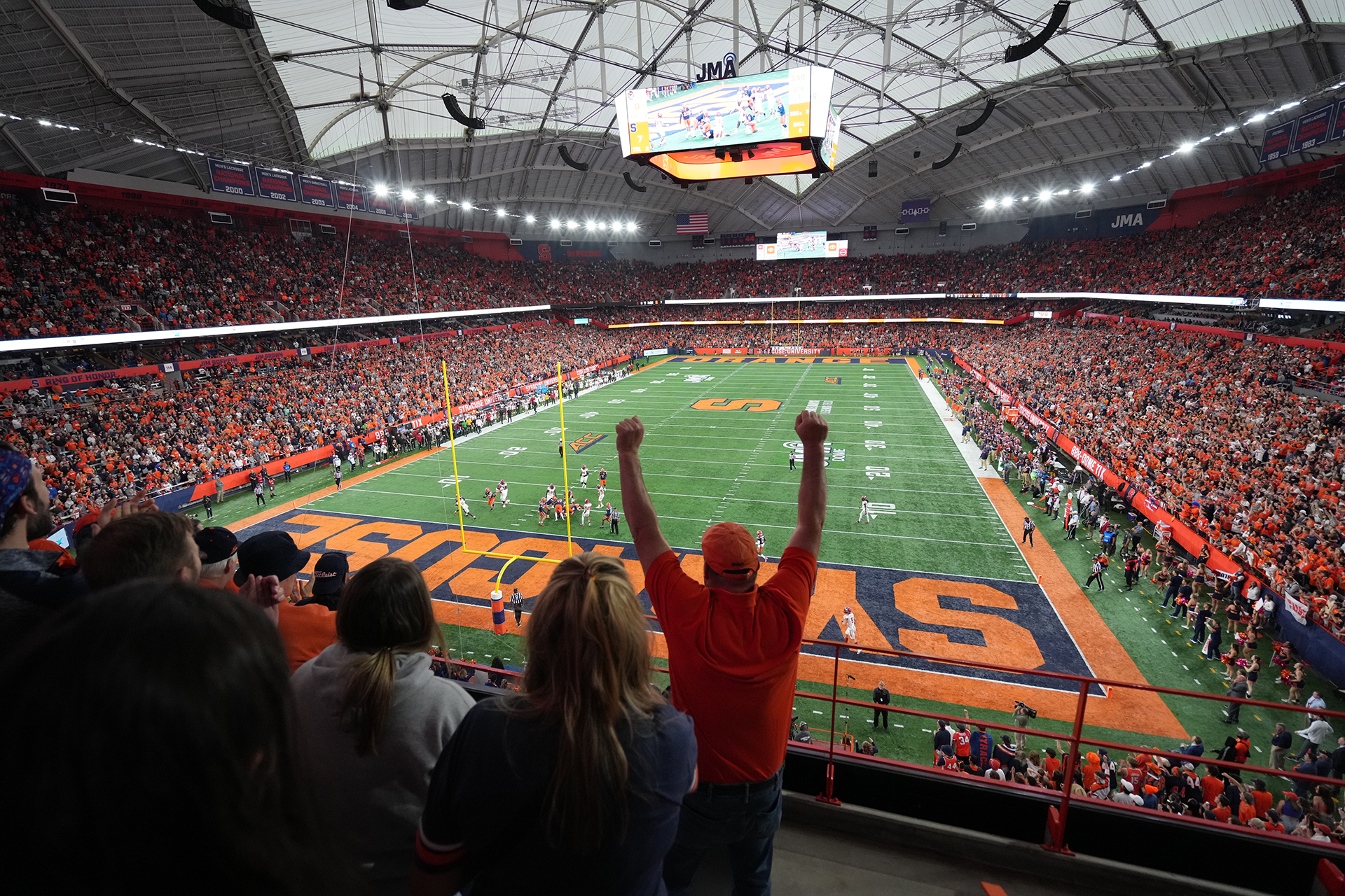 fans cheering at the dome