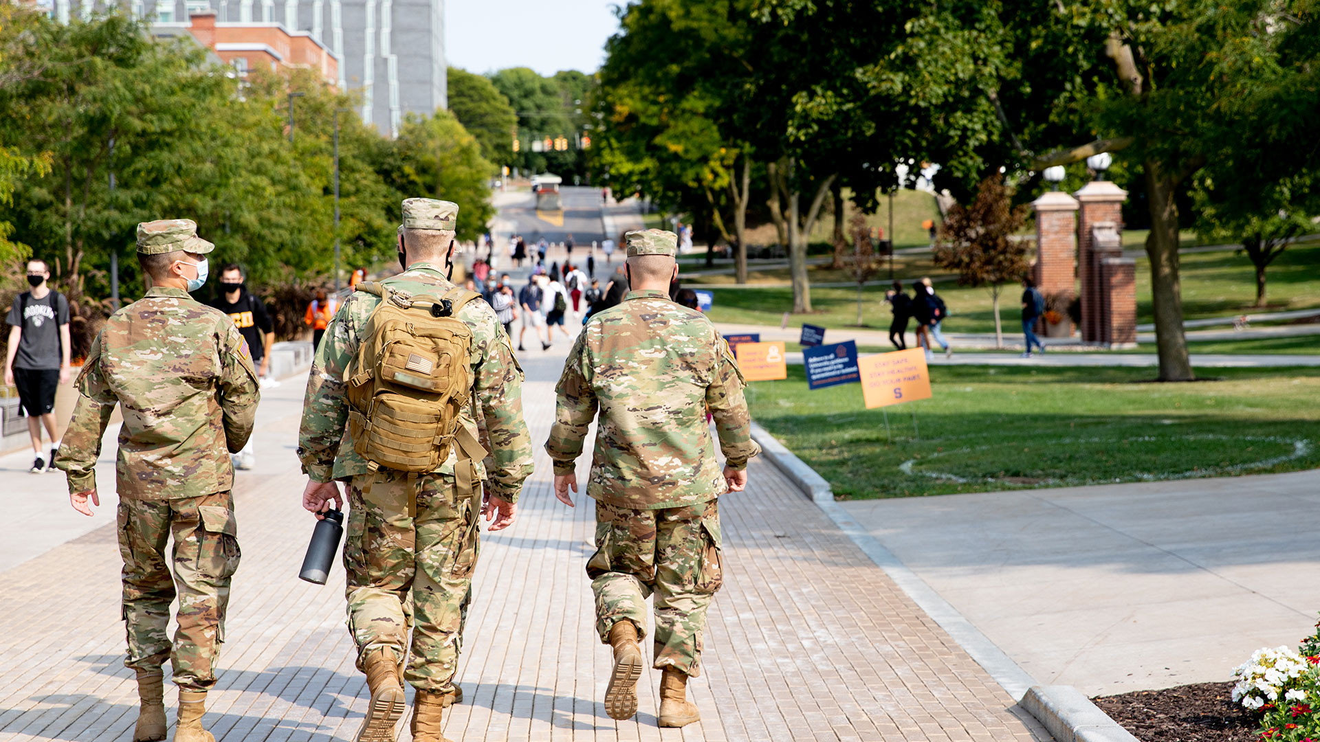 Cadets walking down the sidewalk